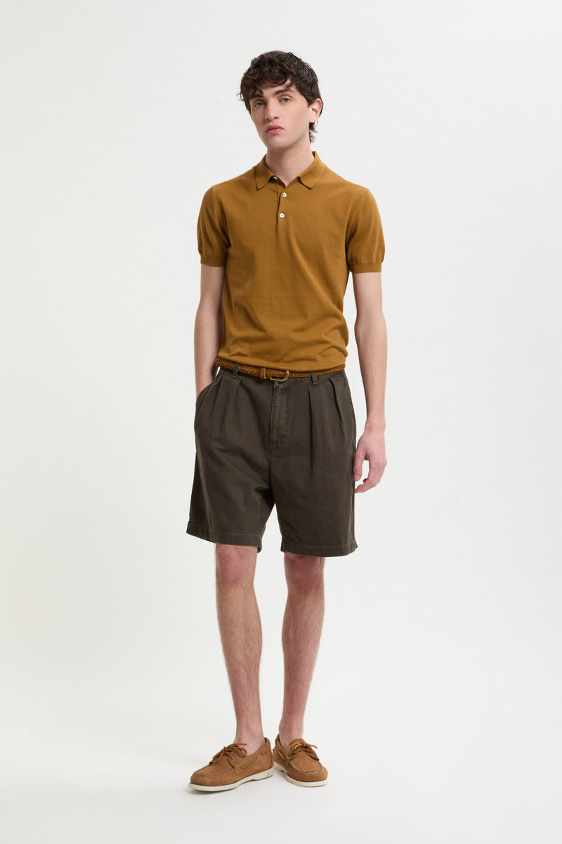 Shorts in tela tinti in capo