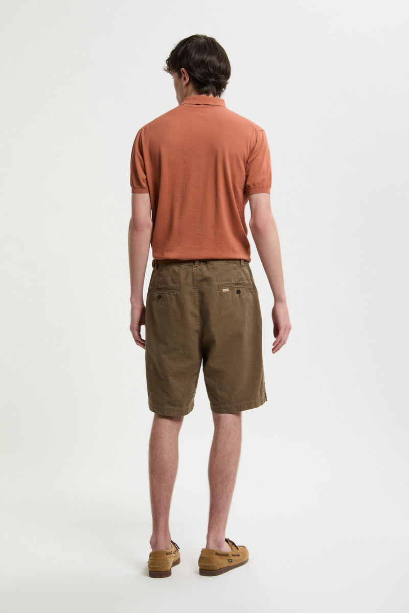 Shorts in tela tinti in capo