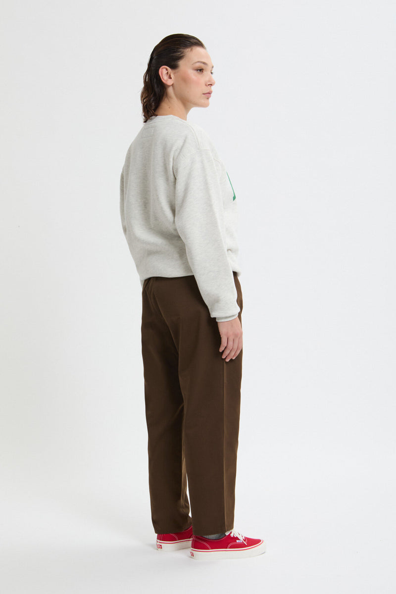 Pantaloni in twill a vestibilità affusolata con piega interna