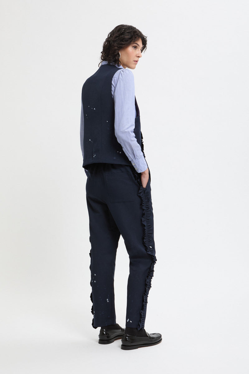 Pantaloni con frappe laterali