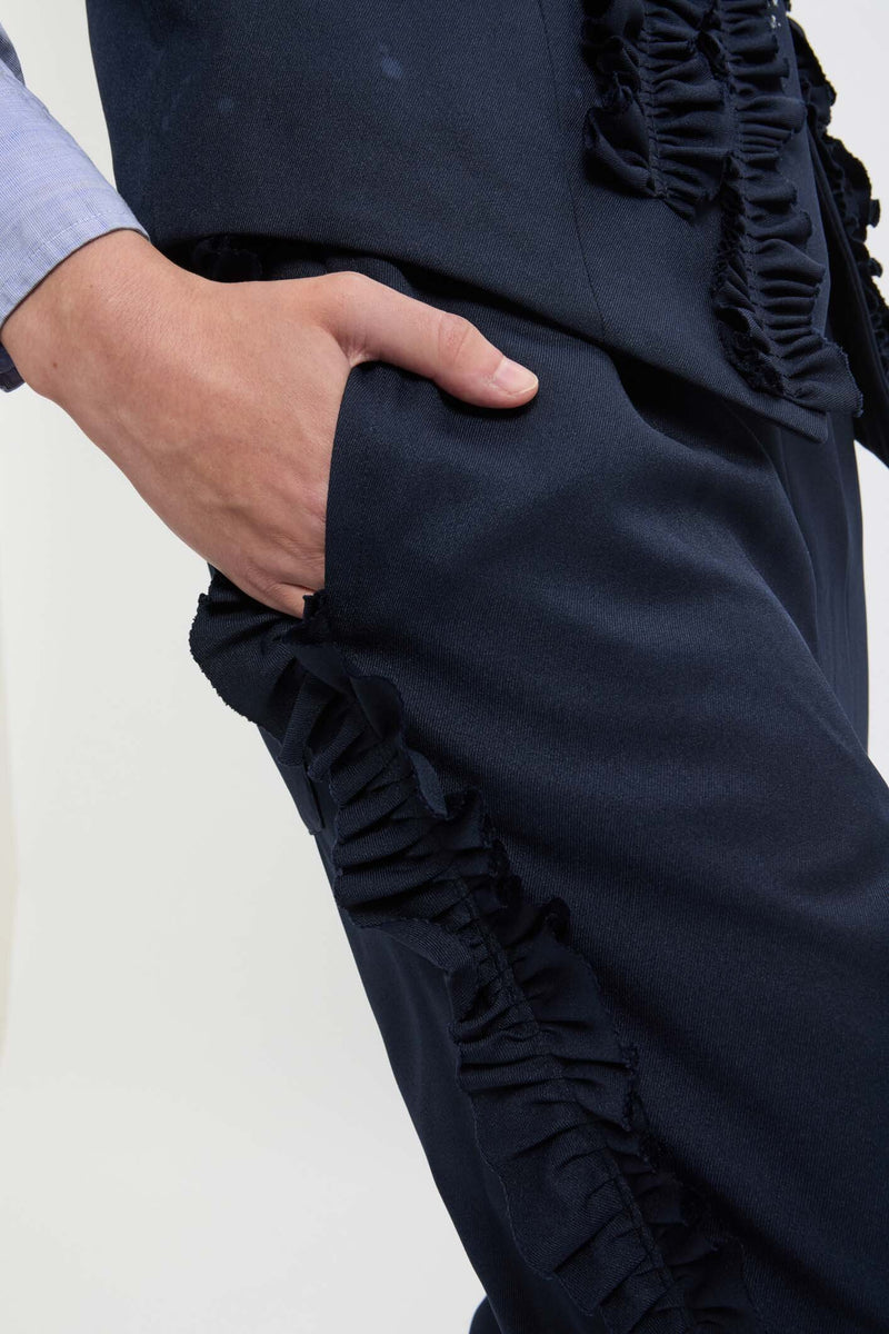 Pantaloni con frappe laterali